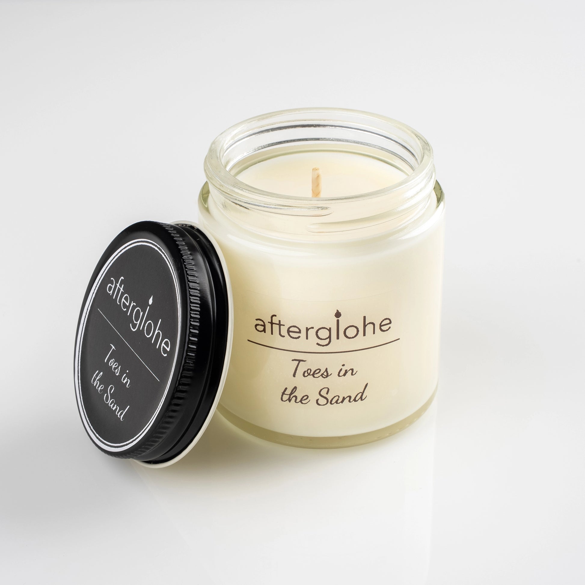 Single four ounce afterglohe Scented Candle