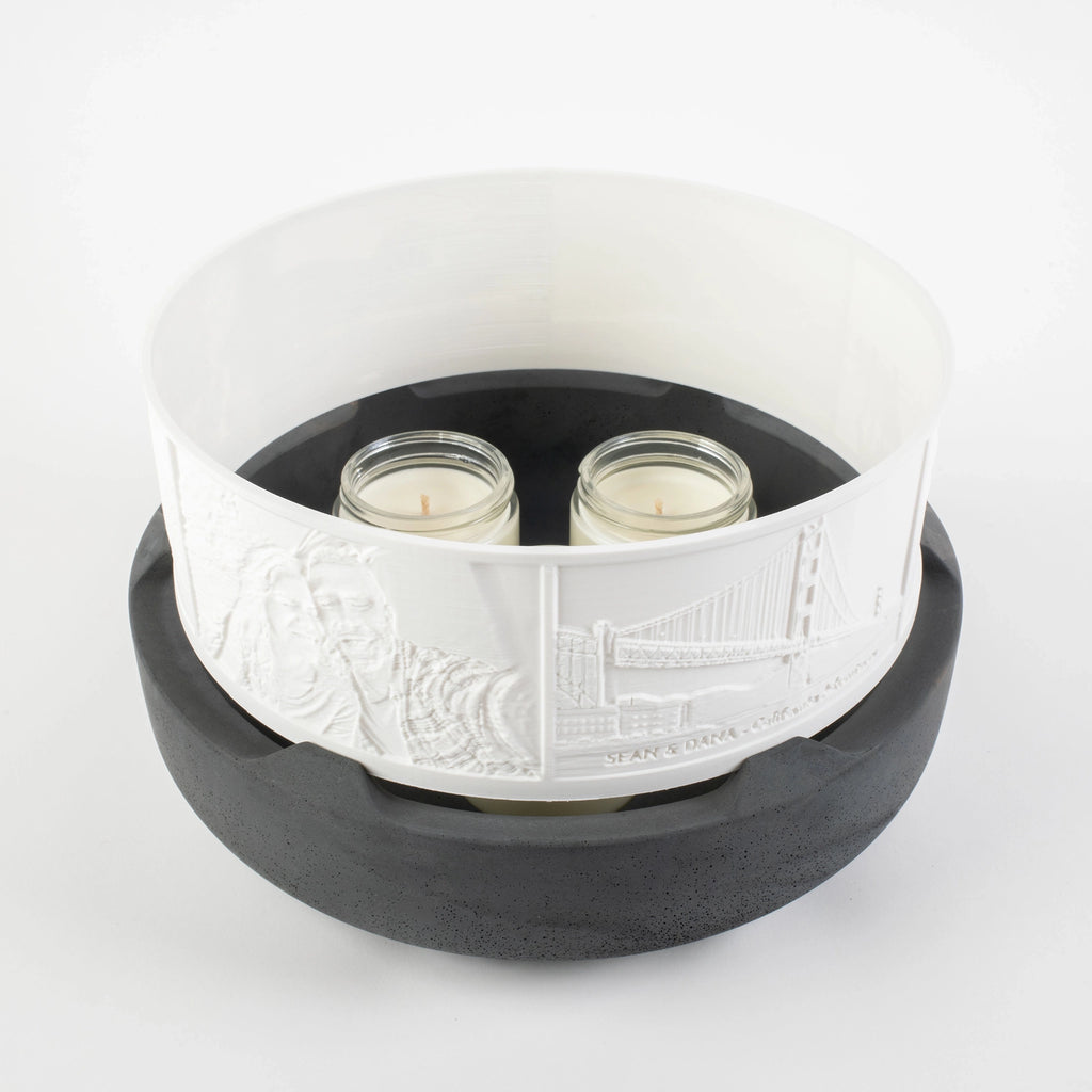 Halo Grande on River Granite color Concrete Base illuminated by candles
