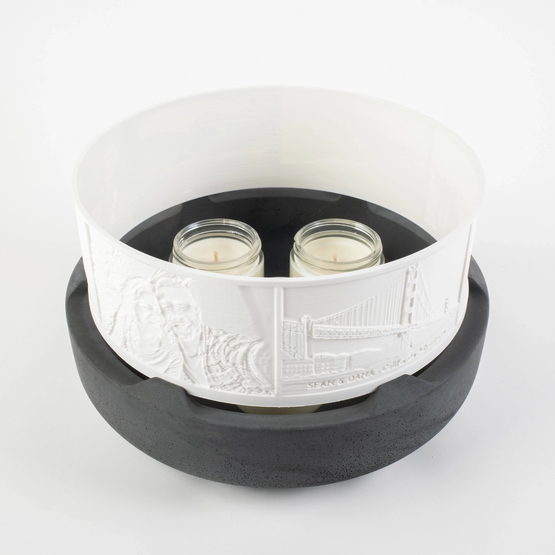 Halo Grande on River Granite color Concrete Base illuminated by candles