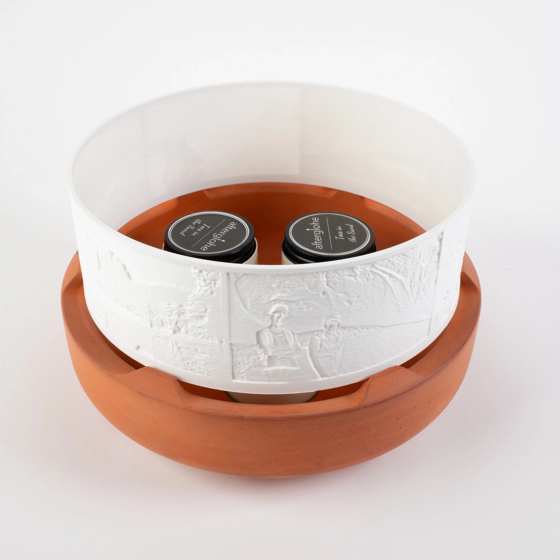Halo Grande with Terra Cotta colored Concrete Base illuminated with candles