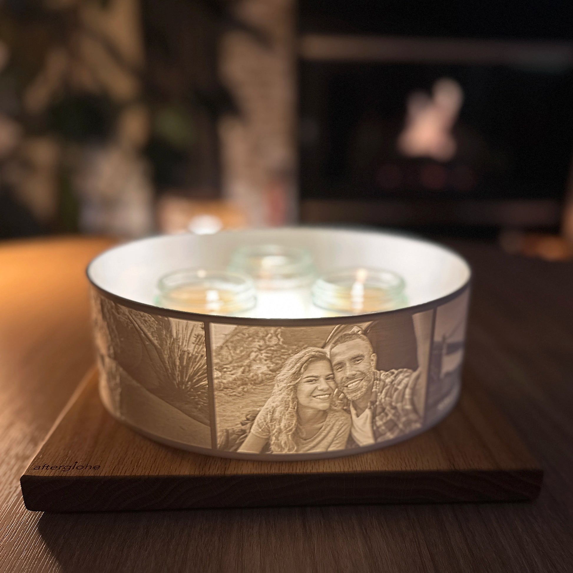 Halo Grande Personalized Photo Display illuminated by three scented candles remembering a young couple's hiking vacation.