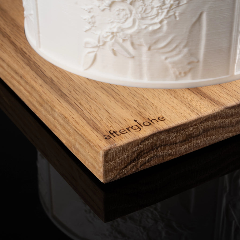 Close up of Halo personalized photo display on oak wood base