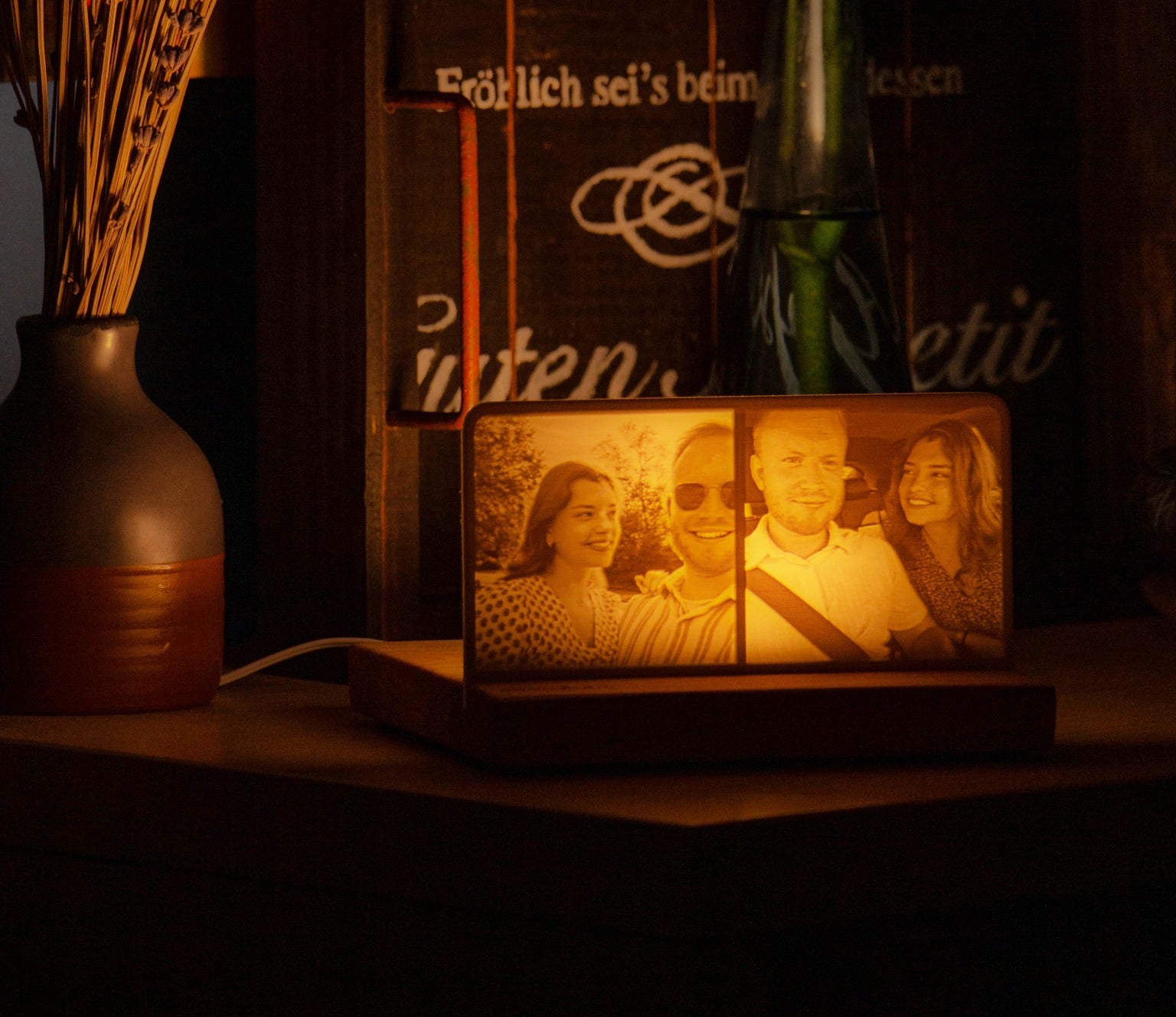 StoryLine-Mini personalized lithophane photo display on top of a softly lit cabinet featuring a young couple in love