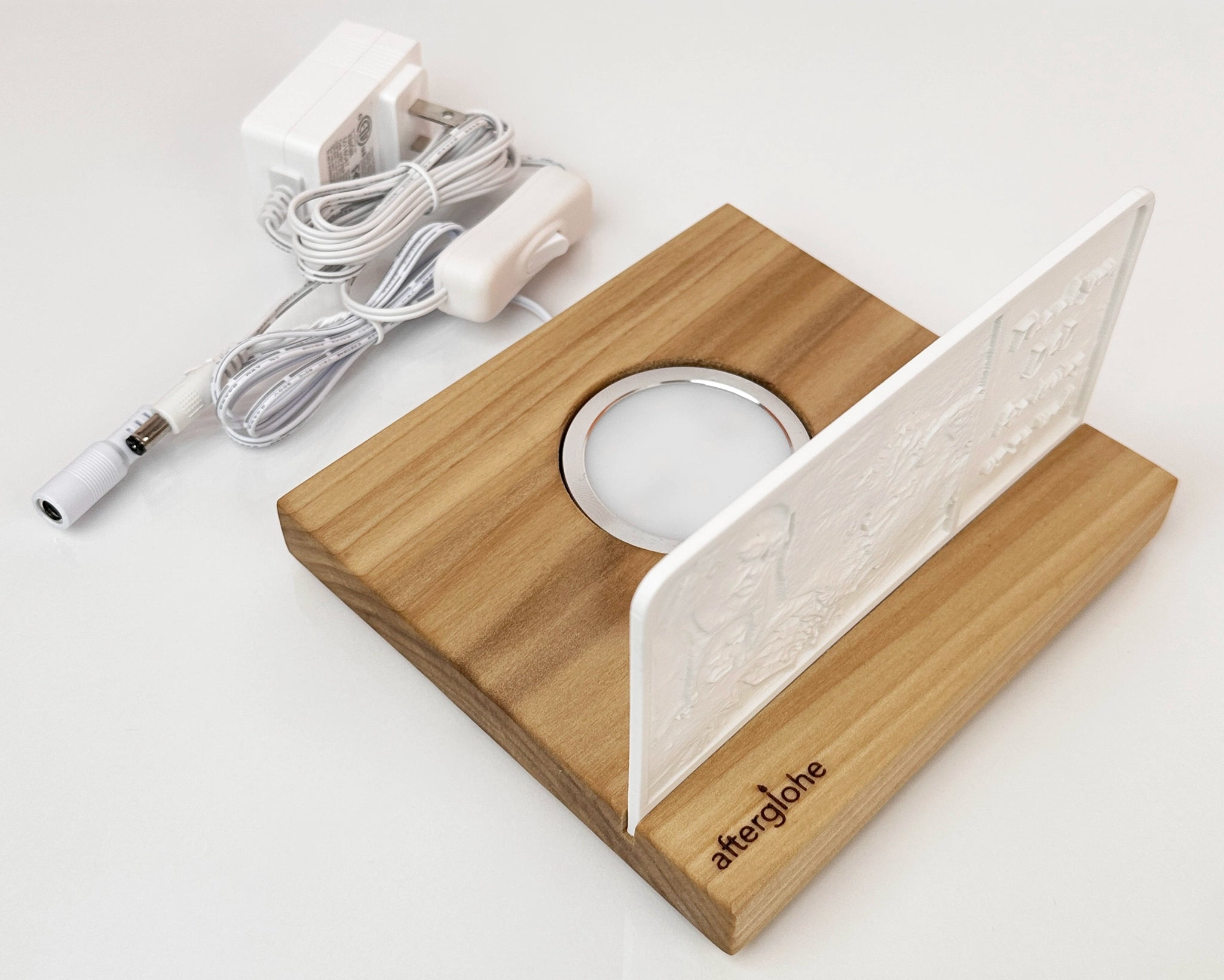 StoryLine-Mini Personalized Photo Display showing included components of wood base, LED, and photo canvas.